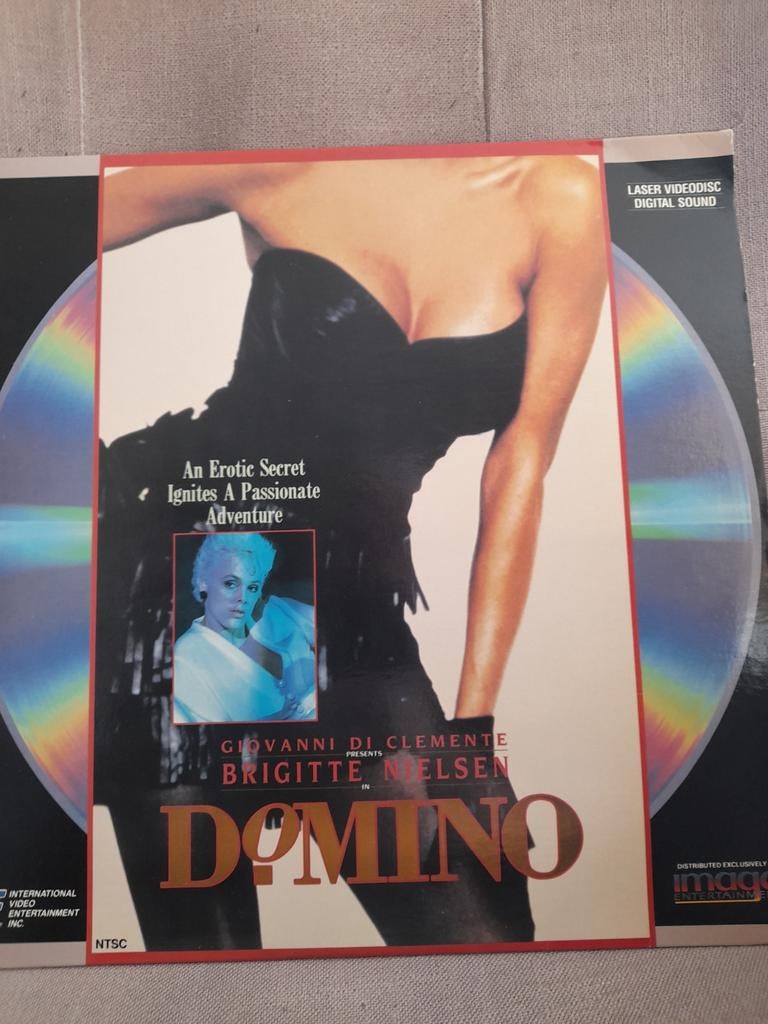 Laserdisc  Domino, Ophalen of Verzenden, Zo goed als nieuw