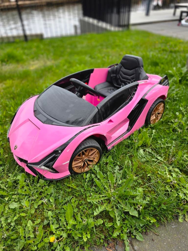 Roze kinderauto met oplaadbare batterij, zo goed als nieuw, Ophalen of Verzenden