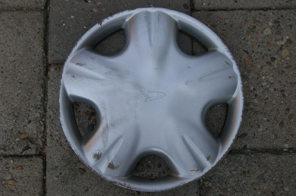 1 losse originele wieldop Daihatsu Cuore 13 inch, Auto diversen, Wieldoppen, Gebruikt, Ophalen of Verzenden