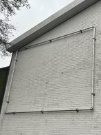 Spandoek frame voor buitenreclame, Ophalen