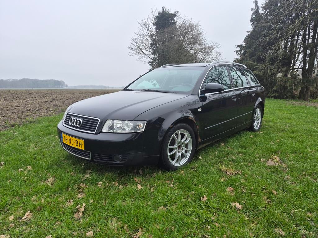 Audi A4 1.9 TDI Avant 74KW 2003 Zwart, Auto's, Audi, Voorwielaandrijving, Stof, Zwart, 4 cilinders