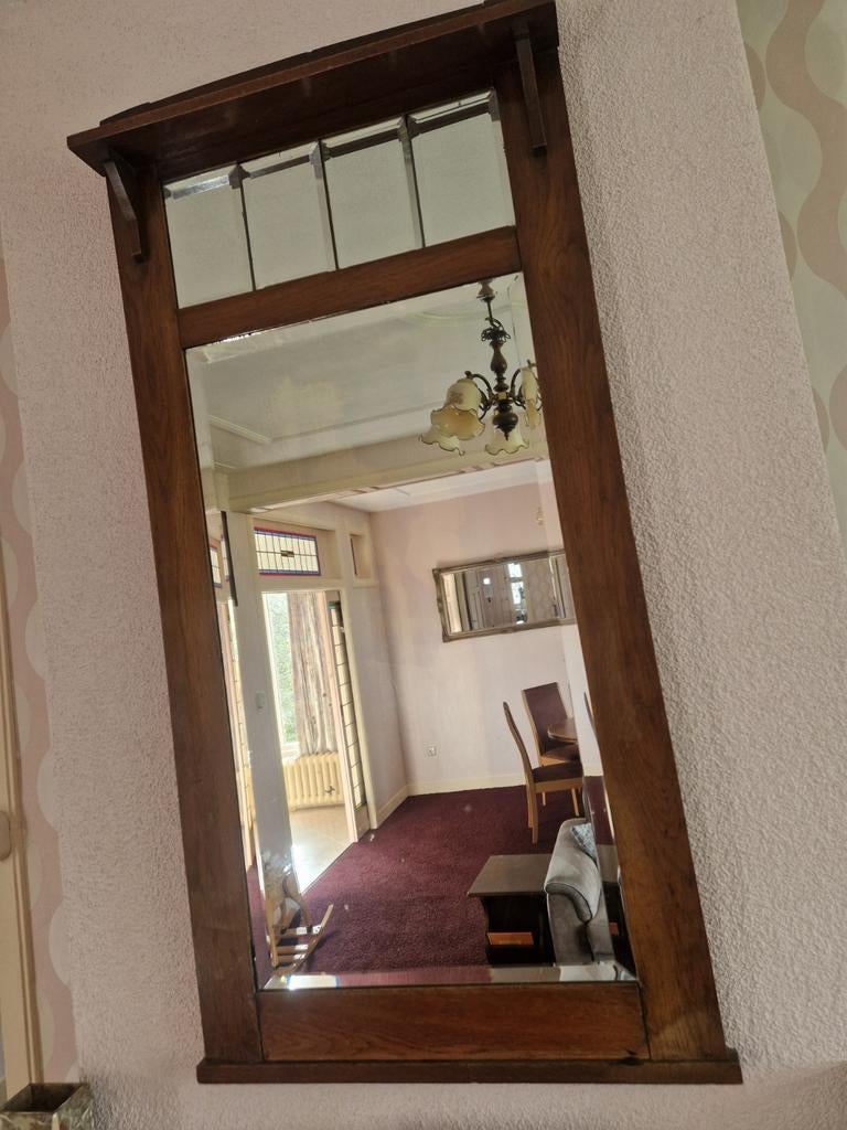 Antieke Amsterdamse School spiegel, Ophalen