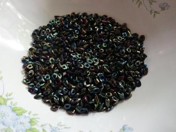 +/- 56 gram Zwart met paarse petrol glans glas kraaltjes beschikbaar voor biedingen