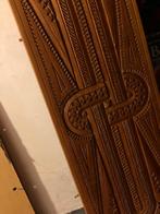 Houten paneel houtsnijwerk, Ophalen