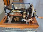 Antieke Pfaff naaimachine, Ophalen
