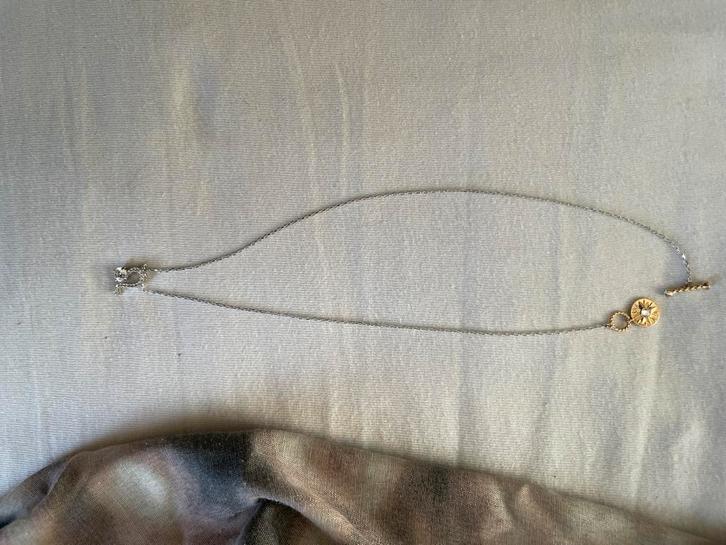 Swarovski zodiac II pendant Leo, Sieraden, Tassen en Uiterlijk, Kettingen, Zo goed als nieuw, Overige materialen, Goud, Ophalen of Verzenden