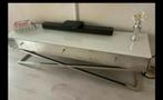Moderne TV-meubel met glazen blad, Gebruikt, 100 tot 150 cm, Ophalen of Verzenden, Glas