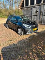 Toyota Aygo X 1.0 Vvt-i MT 72pk 2023 Zwart, Auto's, 31 €/maand, 920 kg, 4 stoelen, Zwart