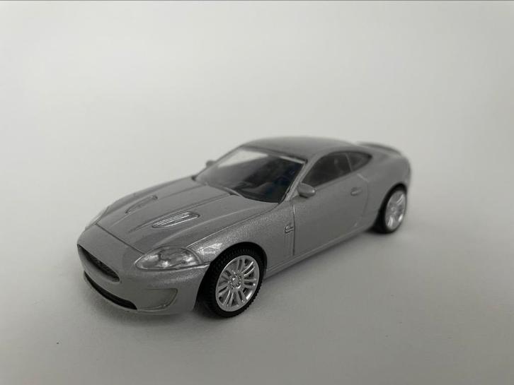model Jaguar XKR.  Zilvergrijs, 1/43 , Rastar, Hobby en Vrije tijd, Modelauto's | 1:43, Gebruikt, Auto, Ophalen of Verzenden