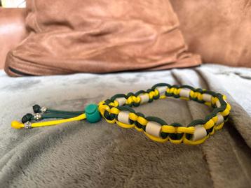 Anti teken bandje met emx kralen beschikbaar voor biedingen