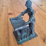 Bronzen beeldje bouwvakker met bouwtekening, Ophalen