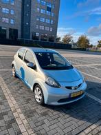 Toyota Aygo 1.0 12V Vvt-i 5DRS 2006 Blauw, Auto's, Voorwielaandrijving, Zwart, 68 pk, Origineel Nederlands