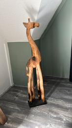 Houten giraffe, Ophalen
