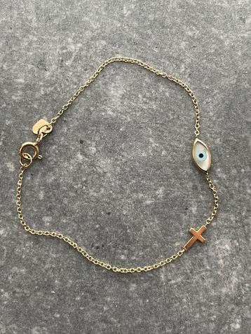 14 karaat (585) geelgouden armbandje 16,2 cm met bedels beschikbaar voor biedingen
