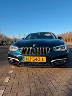 BMW 1-Serie 118i 136pk EDE Aut 2017 Blauw, Auto's, BMW, Blauw, Leder en Stof, Origineel Nederlands, 650 kg