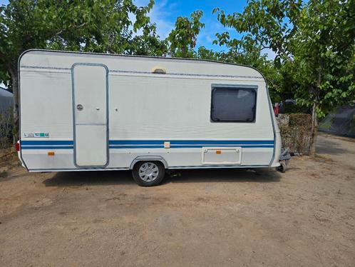 Adria Unica PH 430 uit 2002 met nieuwe voortent en mover., Caravans en Kamperen, Caravans, Particulier, tot en met 4, Treinzit