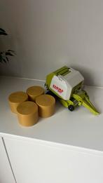 Bruder claas rollant 250 hooipers met 4 ronde balen, Ophalen of Verzenden, Zo goed als nieuw