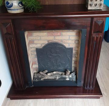 Ethanol haard met houten schouw beschikbaar voor biedingen