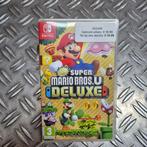 New Super Mario Bros.U Deluxe voor Switch met garantie, Spelcomputers en Games, Games | Nintendo Switch, Ophalen of Verzenden