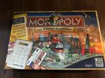 December tip; Monopoly Van dam tot dom, Hobby en Vrije tijd, Gezelschapsspellen | Bordspellen, Ophalen of Verzenden, Zo goed als nieuw