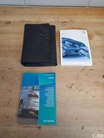 Toyota Aygo 2005 tot 2013 instructieboekje met lederen map, Auto diversen, Handleidingen en Instructieboekjes, Ophalen of Verzenden