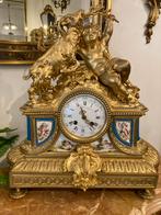 Brons vuurverguld met sèvres porselein, Ophalen