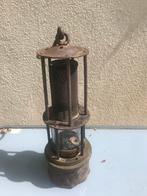 Mijnwerkers lamp, Ophalen