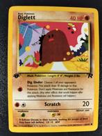 Team Rocket Diglett 1st edition nm, Hobby en Vrije tijd, Ophalen of Verzenden, Zo goed als nieuw, Losse kaart