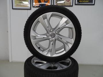 17 inch Opel Astra velgen met all season banden steek 5x105  beschikbaar voor biedingen