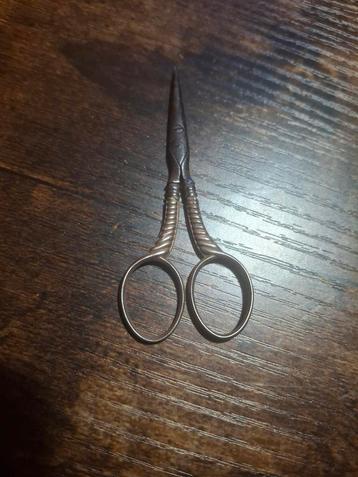 Antiek Zilveren Schaartje beschikbaar voor biedingen
