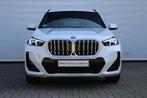 BMW X1 sDrive20i High Executive M Sport Automaat / Trekhaak, Auto's, 1525 kg, Zwart, 156 pk, Wit