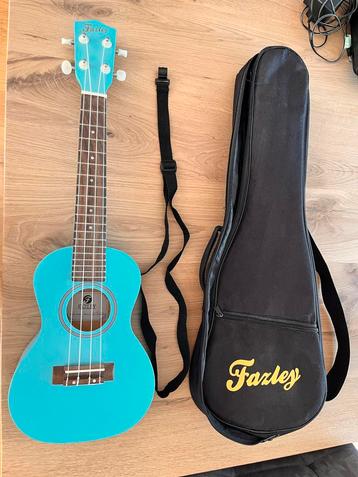 Fazley Ukelele Turkoois + Accessoires beschikbaar voor biedingen