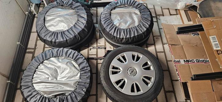 Wieldeksels Opel Corsa D. Inclusief velgen en banden., Auto diversen, Wieldoppen, Ophalen