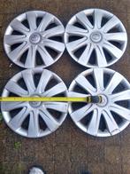 4 originele wieldoppen toyota auris corolla 15-16, Ophalen of Verzenden, Zo goed als nieuw