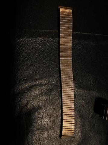 Horlogebandje rekbaar zilverkleurig 20mm en 17cm lang beschikbaar voor biedingen