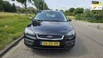 Ford Focus 1.8-16V Ambiente Flexifuel, Auto's, Gebruikt, Zwart, 4 cilinders, 1219 kg