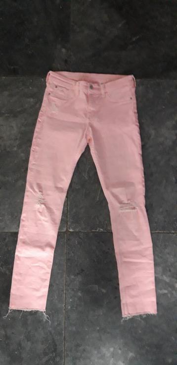 Roze enkelbroek 158 beschikbaar voor biedingen