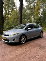 Toyota Auris 1.8 Full Hybrid 5DR CVT 2010 Blauw, Auto's, Toyota, Stof, 74 €/maand, 4 cilinders, Blauw