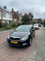 Skoda Octavia 1.2 TSI Combi 2010 Zwart, Voorwielaandrijving, Euro 5, Stof, Zwart