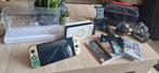 Nintendo Switch OLED - Zelda edition. Starter pakket, Spelcomputers en Games, Spelcomputers | Nintendo Switch, Ophalen of Verzenden