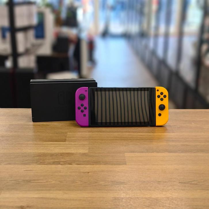 Nintendo Switch 2019 Spelcomputer | Paars/Oranje - Prima!, Spelcomputers en Games, Spelcomputers | Nintendo Switch, Zo goed als nieuw