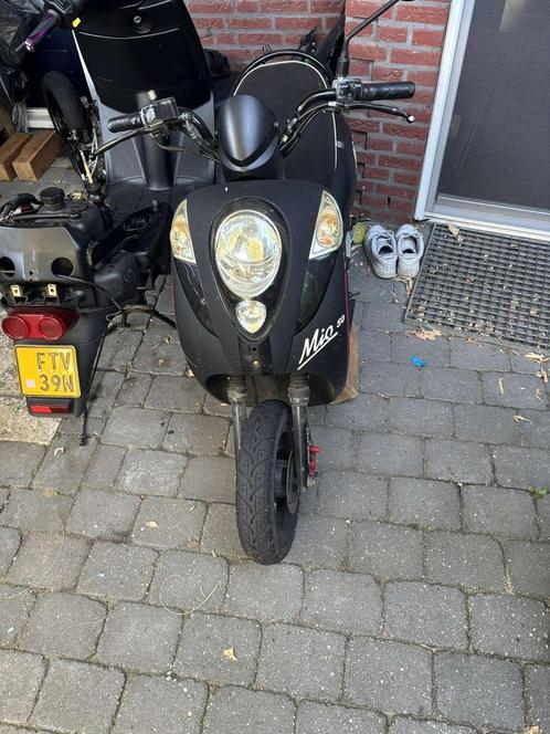 Sym mio 50 scooter, Fietsen en Brommers, Scooters | SYM, Zo goed als nieuw, Mio, Maximaal 45 km/u, Benzine, Ophalen of Verzenden