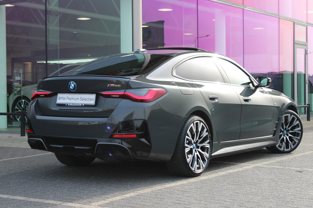 BMW i4 M50 High Executive / Schuif-kanteldak / Trekhaak / La, Auto's, BMW, Gebruikt, Met garantie (alle), Leder, 2190 kg