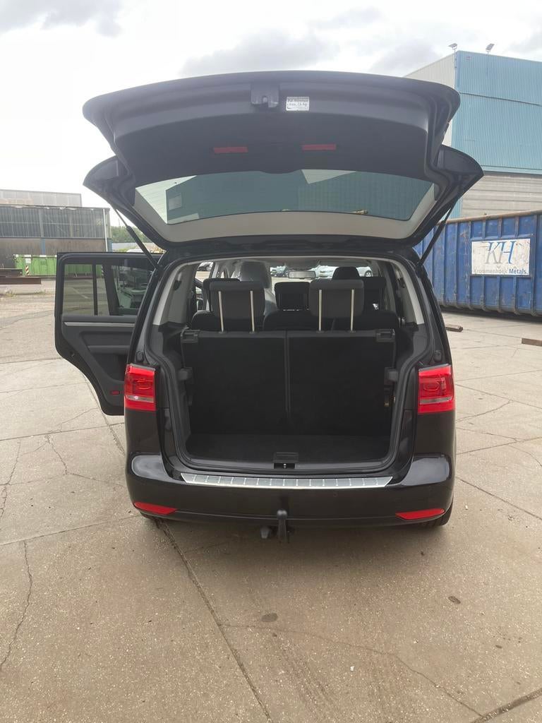 Volkswagen Touran 1.2 TSI 77KW BMT 7P 2011 Zwart km: 263xxxx, 4 cilinders, 7 stoelen, Zwart, Origineel Nederlands
