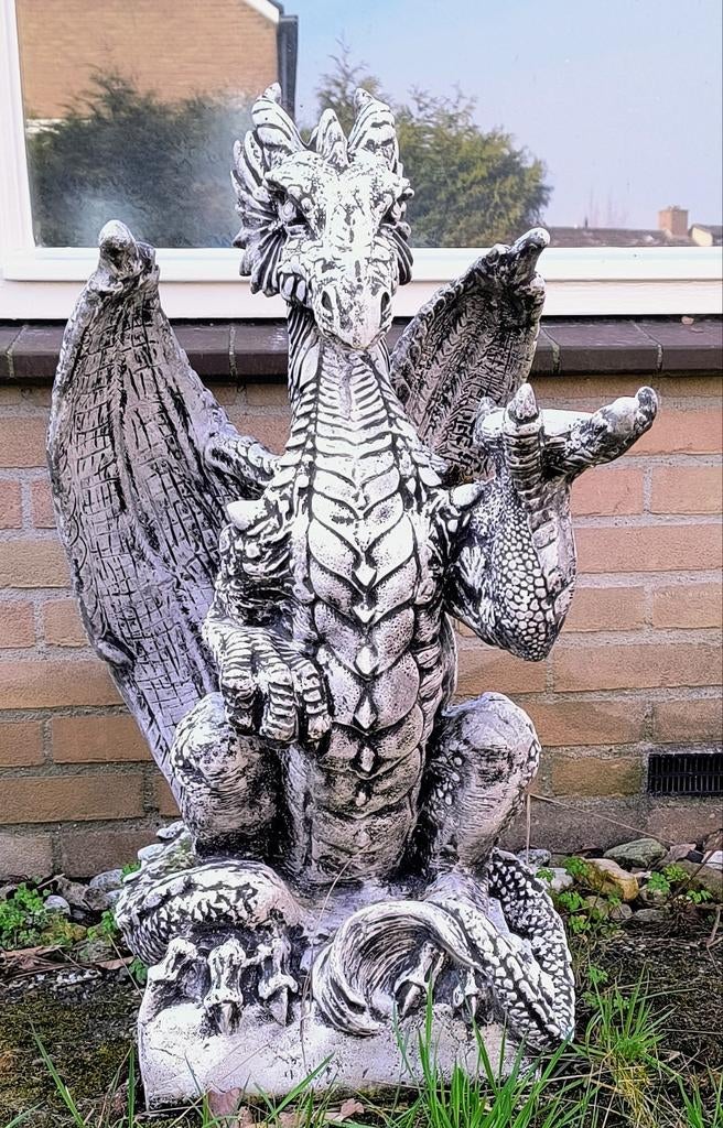 Groot betonnen draak, Ophalen