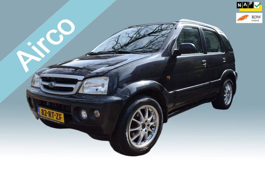 Daihatsu Terios 1.3 SXE. Trekhaak, Airco, Lichtmetalen velge, Auto's, Daihatsu, Elektrische ramen, 4 cilinders, 400 kg, Zwart
