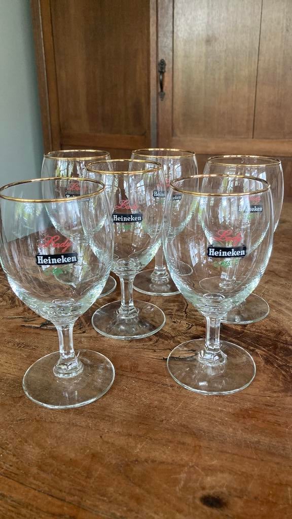 Vintage Lady Heineken bierglas op voet, Ophalen of Verzenden, Zo goed als nieuw, Bierglas