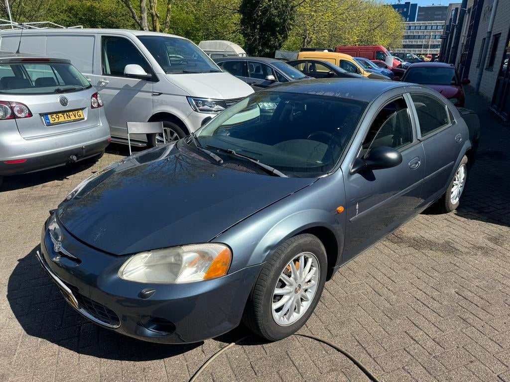 Chrysler Sebring 2.7 I V6 AUT 2002 Blauw airco 5deurs, Auto's, Chrysler, Zwart, Blauw, Origineel Nederlands, Bedrijf