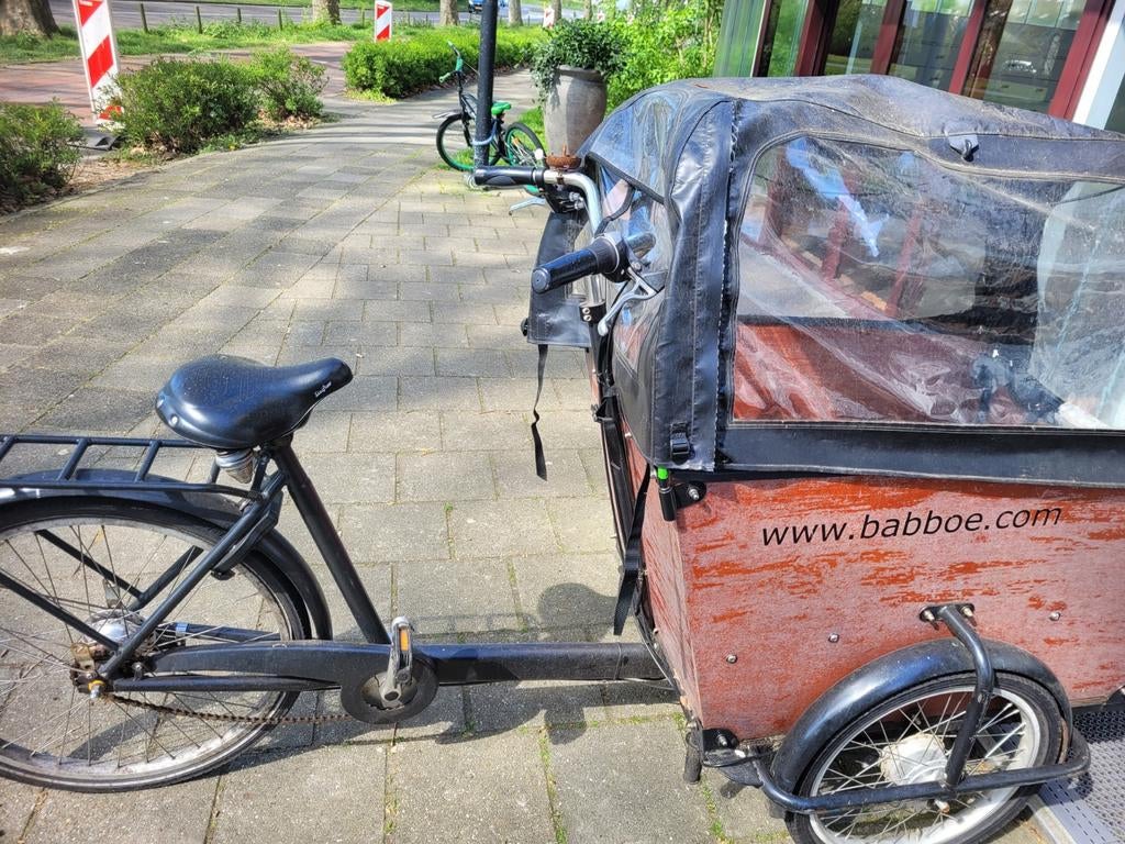 Bakfiets in goede staat met regenhuif en zitbankjes, Fietsen en Brommers, Fietsen | Bakfietsen, Ophalen of Verzenden