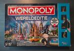 Monopoly Wereld Editie Here & Now, Hasbro, Ophalen of Verzenden, Zo goed als nieuw